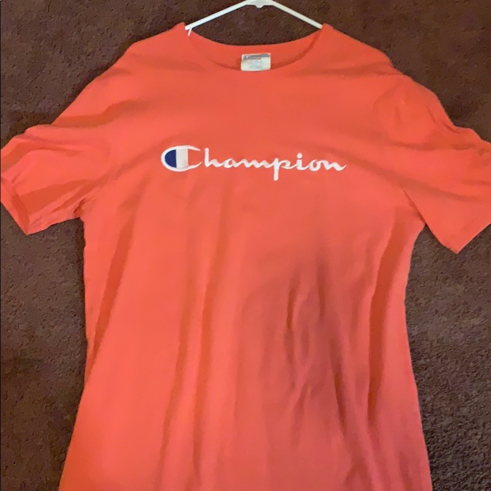 Peach colored champion short sleeve shirt